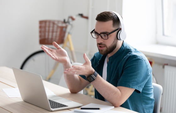 Remote working man speaking during a zoom call