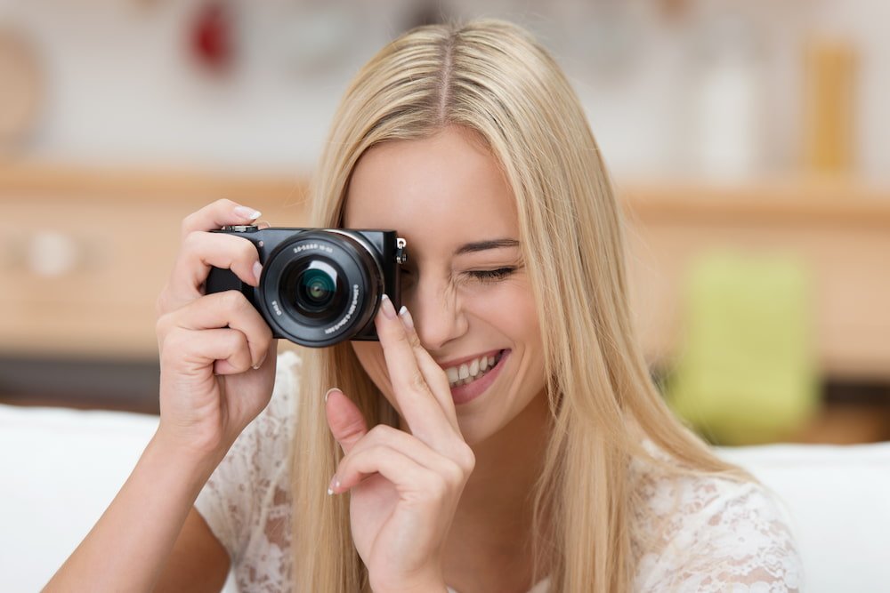 Woman using a digital camera